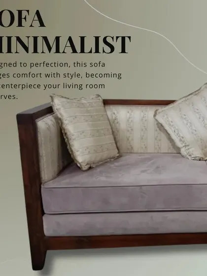 A minimalist sofa with a solid wood frame and light grey upholstery. This piece was designed for a client who wanted a blend of natural wood elements and modern fabric for their living room.