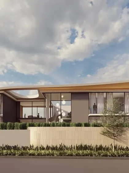The "Galaxy Fall" concept home features a striking, angular roofline that seems to defy gravity. The facade is a composition of glass and solid planes, creating a dynamic interplay of light and shadow.