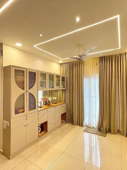 This wide view shows the seamless integration of the living and dining areas. The consistent color palette and lighting design create a cohesive and spacious feel throughout the open-plan layout.