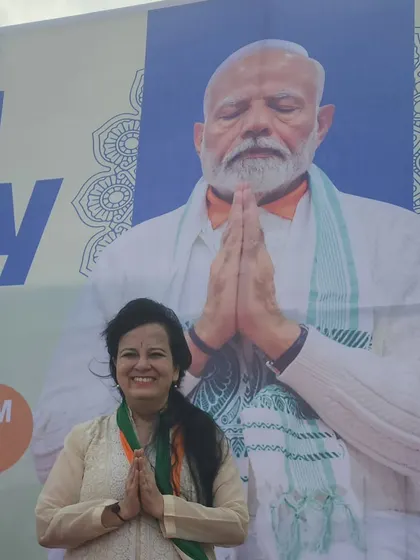 Standing in front of the International Yoga Day banner, feeling grateful for the opportunity to share my passion. These large-scale events allow me to bring the healing benefits of tabla meditation to a wide and diverse audience.