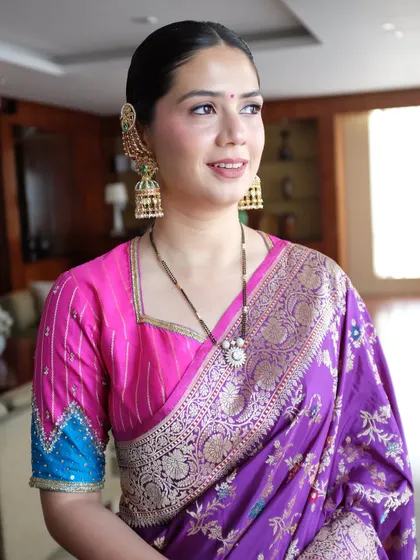 Clean girl aesthetic, but make it desi. This look pairs luminous skin and a clean, sharp winged liner with a traditional saree and jewelry for a modern yet classic feel.