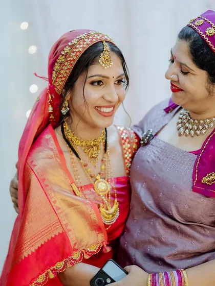 A duplicate of the previous image, showing the bride and her mother.