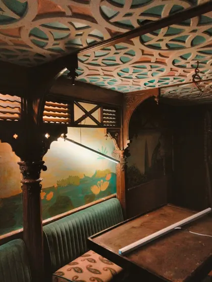 The moody and atmospheric interior of the fine-dine restaurant, where my Mughal-inspired mural sets a vintage and luxurious tone.