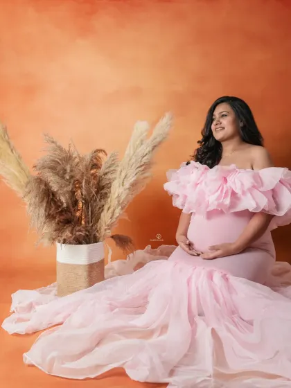 Another angle from this lovely pink gown session, showcasing the flowing train of the dress. My collection of maternity gowns includes many styles with dramatic trains for that extra wow factor.