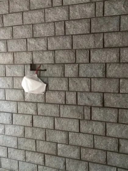 This is an example of wall cladding using uniform, brick-shaped stones. It gives a more organized, yet still natural, look to the wall.