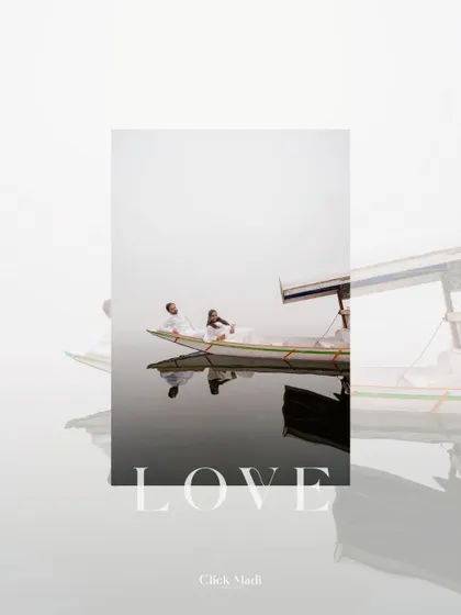 A minimalist and artistic shot of the couple on a Shikara in Kashmir, with the word "LOVE" emphasizing the core emotion of their pre-wedding story.
