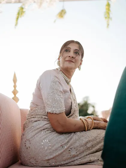 A beautiful candid of the mother of the bride during the ceremony. Her makeup is elegant and timeless.