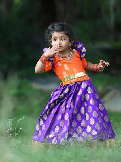 The younger sister in her adorable matching outfit. I made sure the fit was perfect and comfortable for her, so she could play and enjoy the day while looking absolutely precious.