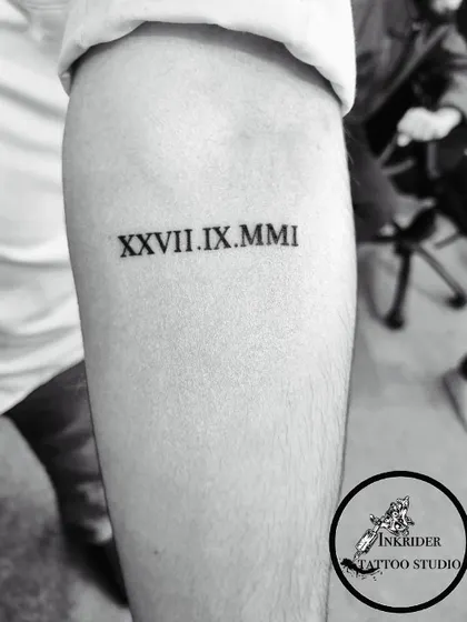 A significant date inked in Roman numerals. This is a classic and stylish way to commemorate a special day forever.