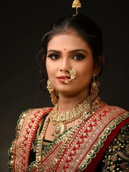 A detailed portrait shot focusing on the flawless base and eye makeup. We practice HD makeup techniques extensively to achieve this level of perfection.