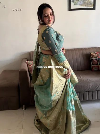 A side view of the Banarasi lehenga, showing the beautiful flare of the silk skirt and the matching embroidered blouse.