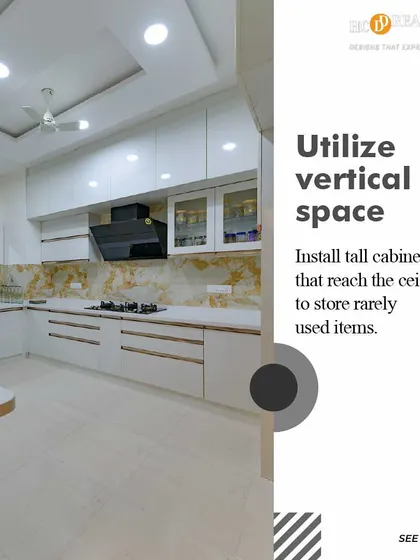 Another example of smart vertical storage in a kitchen. By extending cabinets to the ceiling, we create a clean, seamless look while maximizing storage capacity for a more organized and functional cooking space.