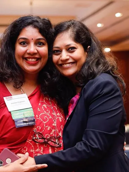 A warm hug with a friend and fellow BNI member. The support we give each other as women entrepreneurs is truly special.