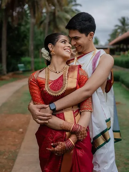 The pure joy of starting a new life together. This candid moment of laughter and love between Alankrita and Sanjith perfectly captures the happiness of their wedding day at Panchavati Pavilion.