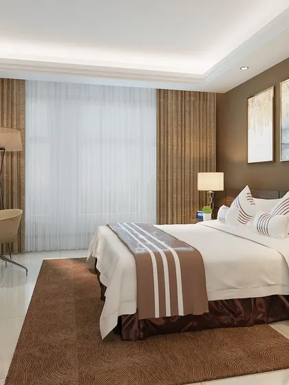 Another example of a well-designed bedroom that contributes to mental well-being, with its balanced color scheme and comfortable furnishings.