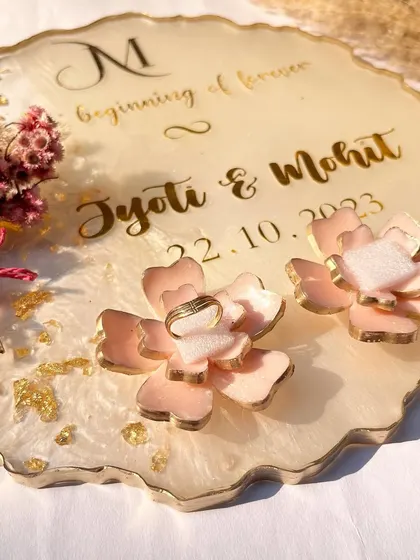 Another shot of the rose ring holder platter, showing the rings placed for the ceremony.