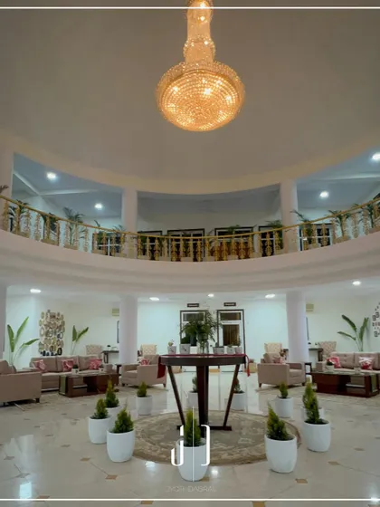 The grand lobby of the Jolly Grant Airport State Guest House. We transformed this space in just five days, creating a luxurious and welcoming atmosphere with a double-height ceiling and a stunning central chandelier.