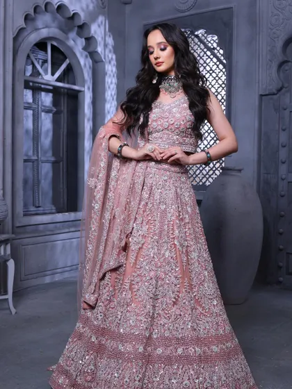The elegance of a pastel lehenga paired with a soft glam look. This is a highly sought-after style, and mastering it will be a key part of your training.