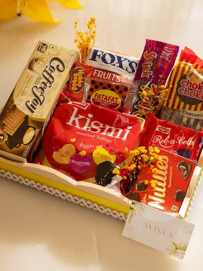 Take a trip down memory lane with our 90s Nostalgia hamper. We pack it with retro candies and snacks like Kismi, Fatafat, and Nutties for a fun and sentimental gift.
