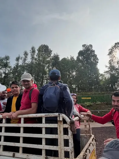 Part of the adventure is the journey itself. Here, the team travels by a local jeep, adding an element of rustic charm to their Bandaje waterfall expedition.