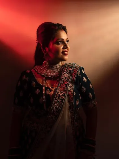 A dramatic bridal portrait using creative red and white lighting to create a bold and modern look.