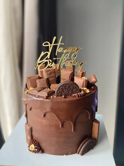 A tall Chocolate Overload cake for a big celebration. This 1kg Chocolate Mousse cake is made with couverture chocolate for an extra rich and decadent flavor.