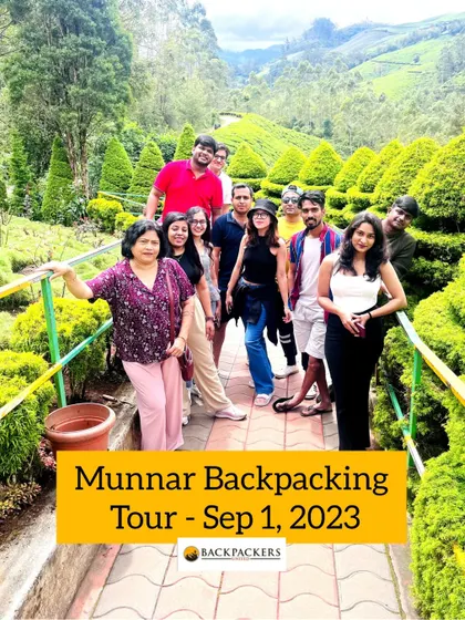 Our happy group from the Munnar backpacking tour in September, posing in a beautiful garden.