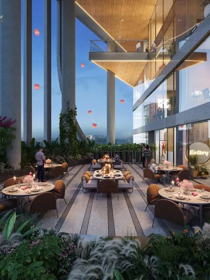 The alfresco dining terraces at the Narmada commercial tower in GIFT City. These spaces are designed to feel like elevated gardens, offering stunning views and a refreshing, nature-filled dining experience.