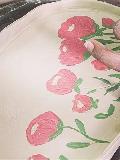 Finger painting isn't just for kids! Sometimes, using your finger is the best way to blend colors and create soft effects on your pottery.