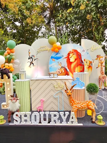 another view of the detailed Lion King stage, showing the light-up "ONE" and personalized name sign.