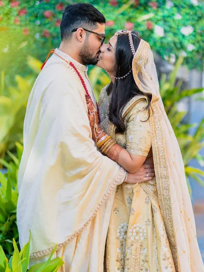A celebratory kiss. We capture the peak moments of joy and love throughout the wedding day.