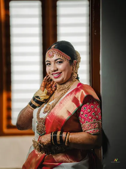 A duplicate of image 233, a beautiful close-up of the smiling bride.
