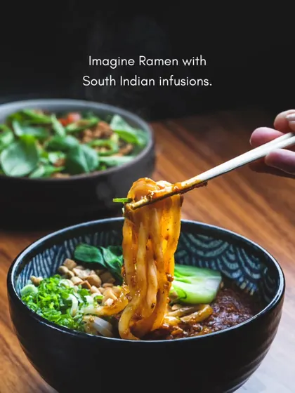 Imagine Ramen with South Indian infusions. We love to push culinary boundaries, and this graphic represents our creative approach to fusion cuisine that sparks curiosity and conversation.