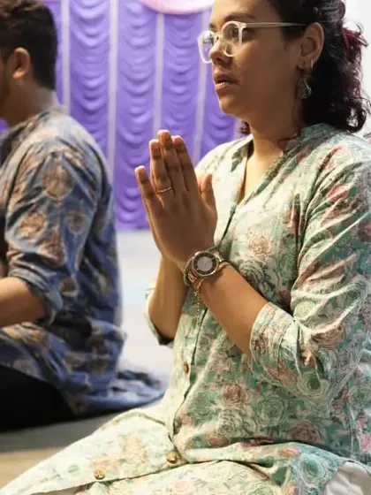 A moment of quiet reflection and prayer during our International Yoga Day event.