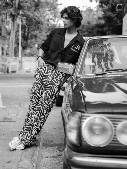 This series features a male model with a vintage Mercedes, shot in both color and black and white. It showcases a cool, retro vibe perfect for a fashion editorial or model portfolio.