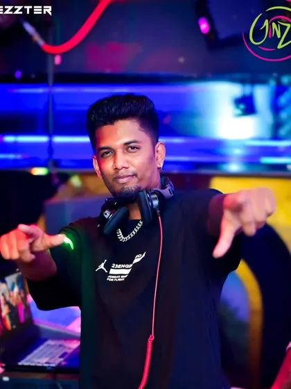 A direct and engaging shot where I'm pointing at the camera. I bring a confident and interactive energy to all my performances.