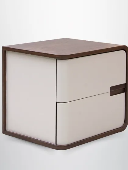 The clean lines and warm wood of this side table make it a versatile piece that can complement a variety of decor styles.