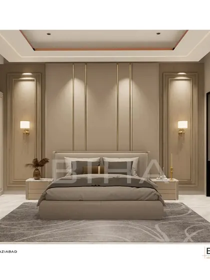 We designed this master bedroom in Ghaziabad as a sanctuary of minimalist elegance. The design centers on a symmetrical, floor-to-ceiling upholstered back panel with integrated brass accents and soft wall sconces. The recessed cove lighting in the ceiling casts a gentle glow, enhancing the serene and calming color palette.