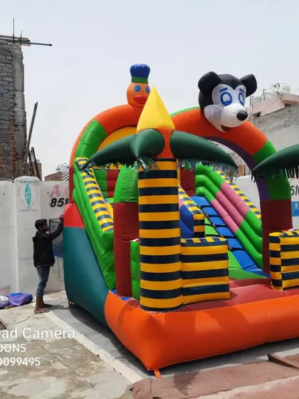 This is a 12 by 18 feet Mickey Mouse themed inflatable, which combines a jumping area with a slide. Combination units like this are always in demand because they offer two types of fun in one structure, giving your customers great value.