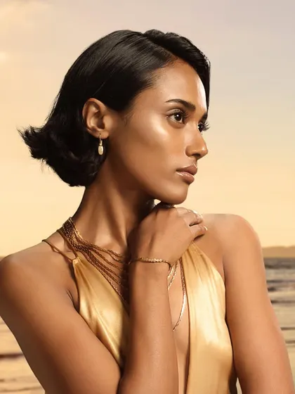 An elegant, golden-hour portrait for a Chambor Geneva campaign. The model's glowing skin and sophisticated look set a luxurious tone for the brand's cosmetic line.