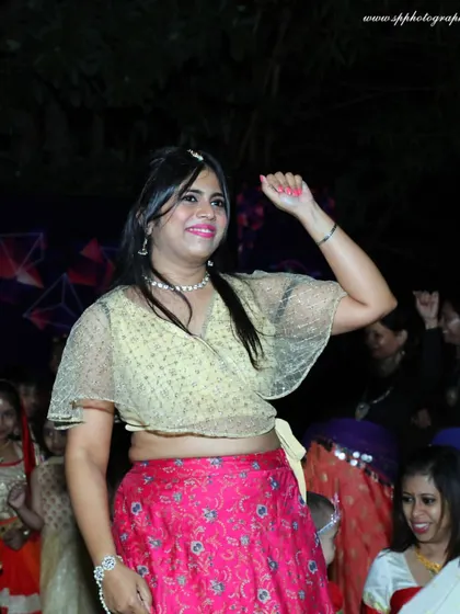 A candid shot of an employee enjoying the dance floor at a corporate party. We capture the relaxed and fun side of your company events, providing photos that highlight team morale and camaraderie.
