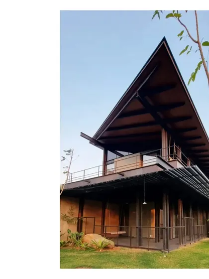 The Lakeshore house is a two story filter, built with a metal frame and rammed earth walls. The design allows breezes, views, and bird calls to pass through, connecting the inhabitants with the stunning 50 acre site.