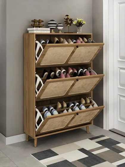 A slim and stylish shoe rack with tilting drawers, perfect for an entryway. The wooden finish and minimalist design keep your footwear organized and out of sight.
