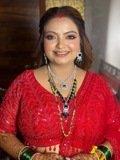 The bold and beautiful reception look in red, showcasing a glamorous side of the bride.