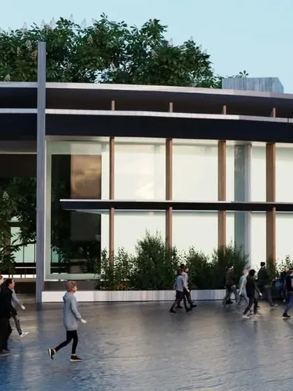 A rendering showing the entrance of the circular building concept. The design aims to create a seamless experience, transforming an innovative vision into a stunning, functional reality.