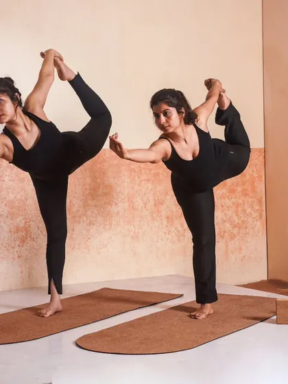 Holding Natarajasana (Dancer's Pose) together. This beautiful balancing pose improves focus and opens the shoulders and heart.