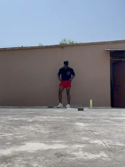 Taking a quick breather during a tough bodyweight circuit on the road.