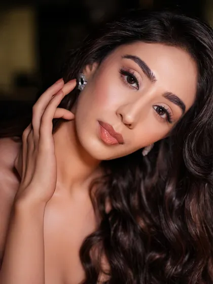 A close-up portrait that showcases the flawless base and soft contour. This minimal glam look is perfect for any party or evening event.