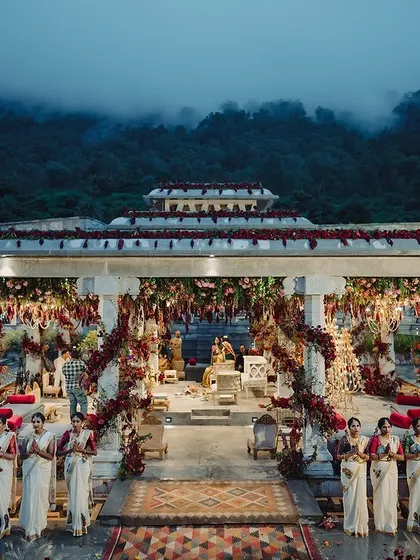 Against the backdrop of the misty Nandi Hills, we designed this breathtaking setup for Rajini and Vishwas's traditional Bunt ceremony. The scale of the venue was matched with dramatic floral arrangements, creating a scene that felt both epic and sacred.