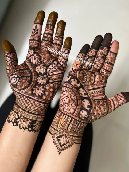 A mix of everything I love in Indian mehndi. You can see elephants, peacocks, and floral patterns all coming together in one design.